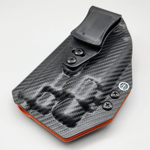 Black carbon fiber Gemini Series Kydex holster with magazine carrier