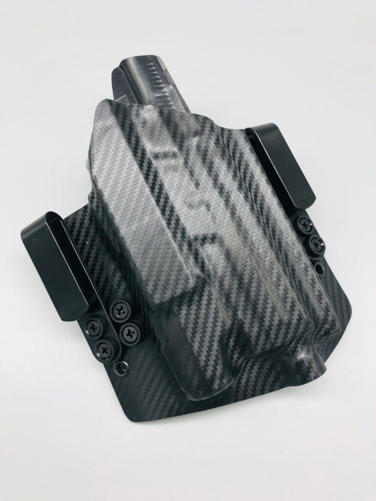 Black carbon fiber Kydex light-bearing holster with twin belt clips