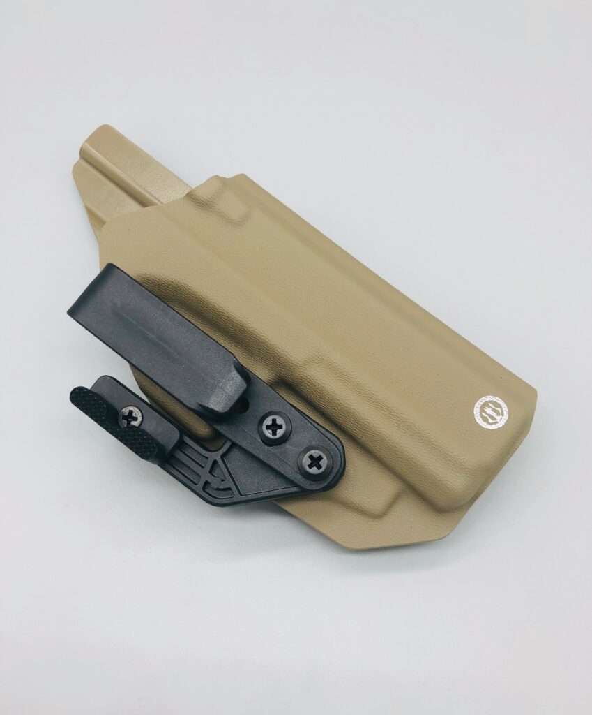 Coyote Proteus Series Kydex IWB holster pressed for a pistol and weapon light