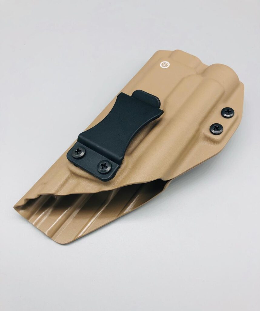 Coyote Kydex Glock 19 IWB holster pressed around a Streamlight TLR-1 weapon light