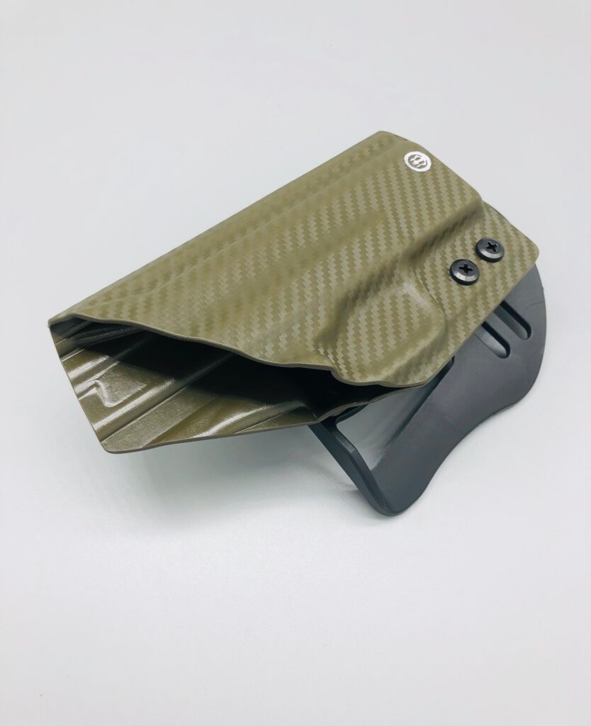 Olive carbon fiber Kydex OWB paddle holster seen from the muzzle end