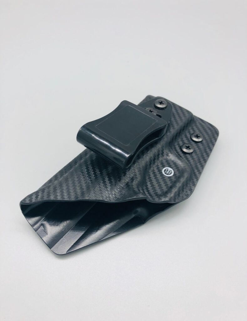 Black carbon fiber Kydex inside-the-waistband holster with a single belt clip