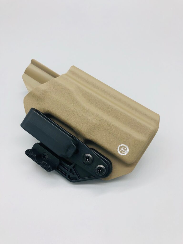 Tan Kydex Proteus Series inside-the-waistband holster with a belt clip