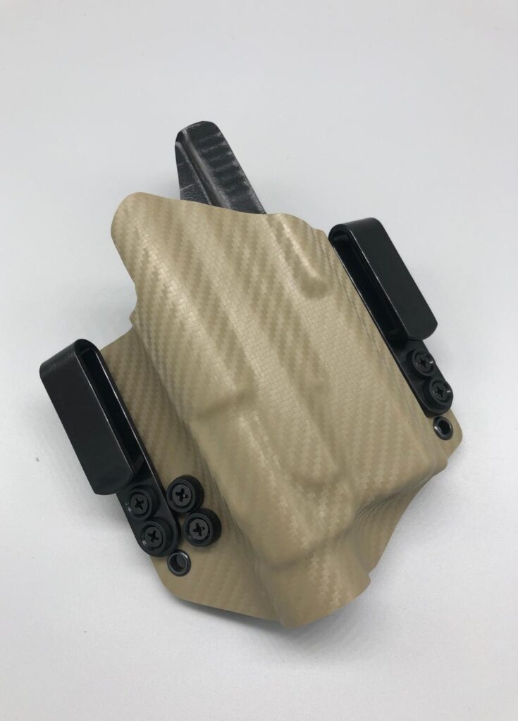 Tan carbon fiber Nestor Series Kydex holster molded for a weapon light