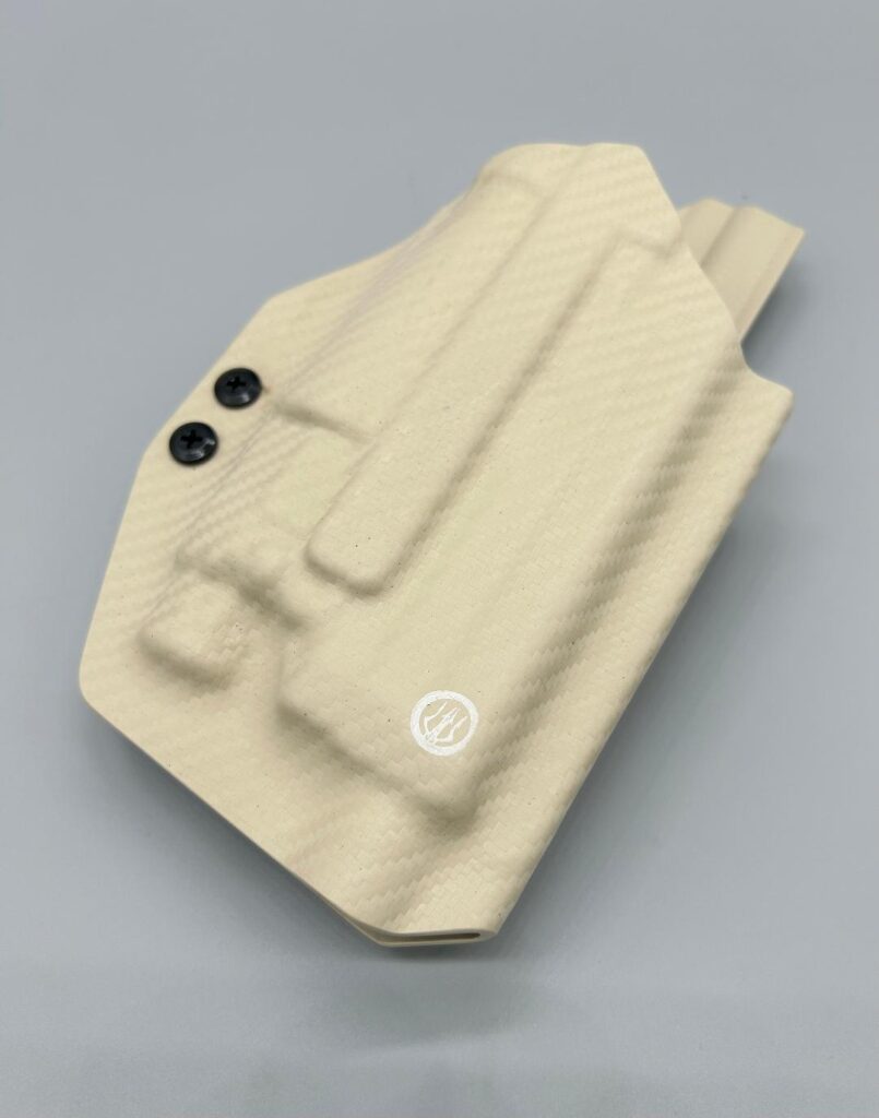 Tan Veritas Series Kydex OWB holster shell molded for a weapon light