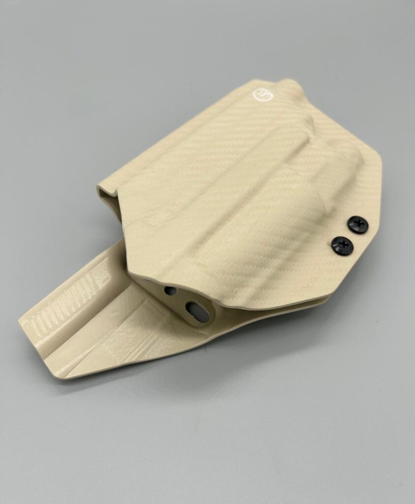 Sand carbon fiber Kydex Veritas Series OWB holster with an integrated belt loop