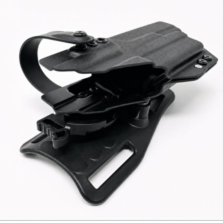 Black Kydex Zeus Level 2 OWB duty holster with retention hood and quick-detach belt plate