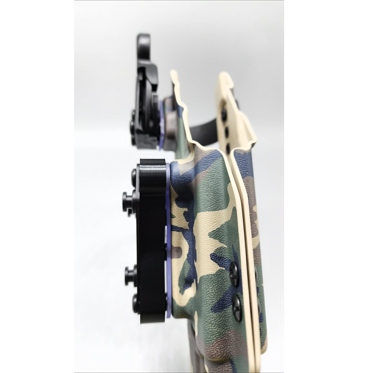 Woodland camo Zeus Level 2 duty holster side profile with black quick-detach mount